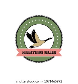 Vector hunting emblem with hand drawn flying wild goose. Beautiful animal design elements, ink drawing.