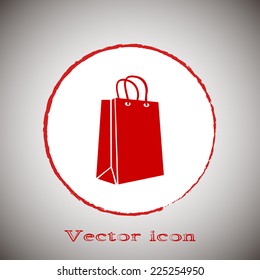 Vector icon bag Red round button on a gray background