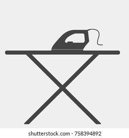Vector icon black iron and ironing board on white background. Home Appliances