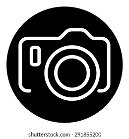 Vector icon of camera on black background with dots