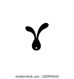 Vector icon with cartoon bunny head. Black rabbit isolated on white. Easter bunny. Flat design.