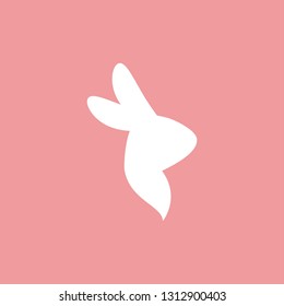 Vector icon with cartoon bunny head. White rabbit isolated on pink bakground. Easter bunny. Flat design