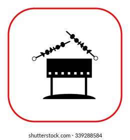 Vector icon of chargrill with kebab on skewers
