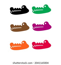 vector icon crocodile head, green, black, brown, purple, orange, red, white background