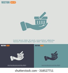 Vector icon hand holding a cart online store, Internet shop. 