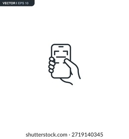 Icono de Vector de una mano que sostiene un teléfono inteligente con un marco de escaneo en la pantalla. Representa Face ID, escaneo de documentos o tecnología de reconocimiento móvil