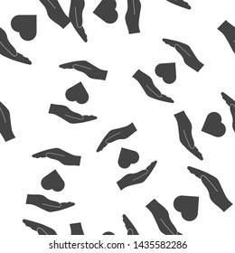 Vector icon of  hands holding a heart. healthcare symbol seamless pattern on a white background.