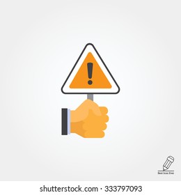 Vector icon of human hand holding triangular warning sign