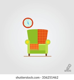 Vector icon of light green armchair with checkered rug and wall clock