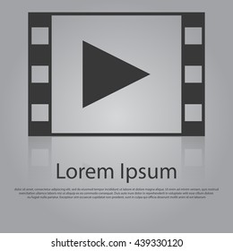 Vector icon of play button in film frame. Media player icon. Flat design style. EPS 10