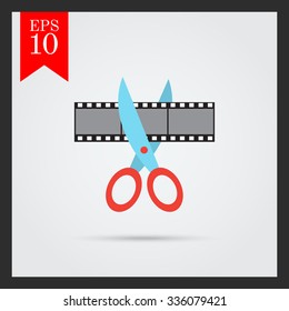 Vector icon of scissors cutting film shot