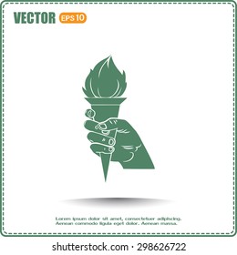 Vector icon  silhouette of a hand with a torch