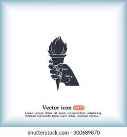 Vector icon silhouette of a hand with a torch