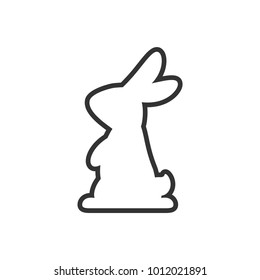 Vector icon with silhouette of rabbit. White bunny with black contour  isolated on white  background. Easter bunny. Flat design.
