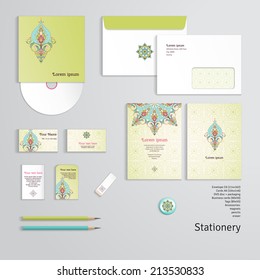 Vector identity templates. Letterhead, envelope, business card, tag, disc with packaging, pencils. Oriental floral pattern. Simple delicate ornament.