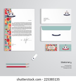 Vector identity templates. Multicolored figures and grid. Beautiful round label with two goats and ribbon. Letterhead, envelope, business card, pencils, eraser. 