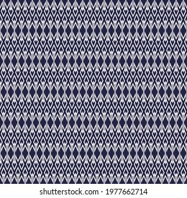 Vector ikat geometric small line and vertical diamond shape seamless pattern traditional blue color background. Use for fabric, textile, interior decoration elements, wrapping.