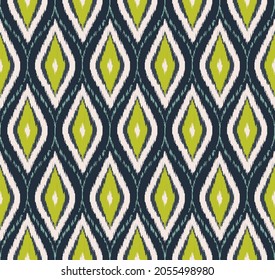 La forma del rhombus de diamante redondo vector ikat ogee forma sin fisuras. Diseño étnico tribal de color azul-verde. Para tela, textil, elementos de decoración interior, tapicería, envoltura.