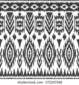 Vector Ikat seamless pattern. Navajo, aztec ornament. Fashion textile, cloth design, fabric, wallpaper, card, wrapping paper. Creative hippies print. Abstract background. American ethnic backdrop.