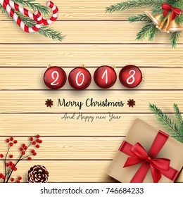 Vector illustration of 2018 merry christmas and happy new year with christmas balls on wood background