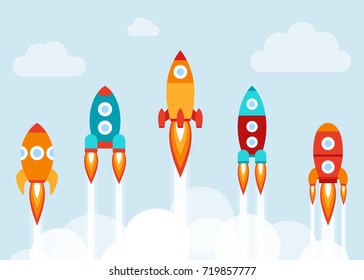 Vector Illustration: 5 Flat Icons With Varicolored Rocket Ships
 Isolated On Light Blue Background With White Clouds. Project Start Up And Development Process. Innovation Product And Management