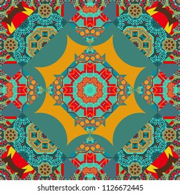 Vector illustration. Abstract kaleidoscope yellow, green and blue background. Bright flower. Seamless pattern illustration for design.