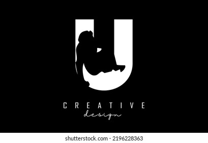 Vector illustration of abstract letter U with urangutan shape cut. Letter logo with creative cut and shape.