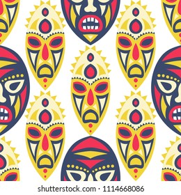 Vector Illustration. Abstract Seamless Background with Ritual Masks for Textile or Paper. Ethnic Seamless Background with Color Trible Ritual Masks for your Design. Vector Texture.
