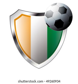Vector illustration - abstract soccer theme - shiny metal shield isolated on white background with flag of Cote d I voire