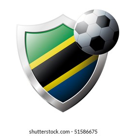 Vector illustration - abstract soccer theme - shiny metal shield isolated on white background with flag of Tanzania