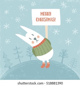 vector illustration of adorable rabbit holding in his hand the banner with Merry Christmas text
