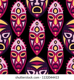 Vector Illustration. African Seamless Background with Ritual Masks for Textile or Paper. Ethnic Seamless Background with Color Trible Ritual Masks for your Design. Vector Texture.
