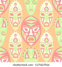Vector Illustration. African Seamless Background with Ritual Masks for Print or Card. Ethnic Seamless Pattern with Color Trible Shamanic Masks for your Design. Vector Texture.