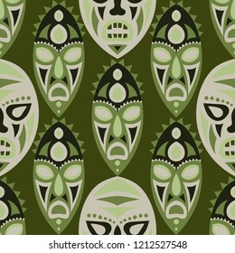 Vector Illustration. African Seamless Background with Ritual Masks for Print or Card. Ethnic Seamless Background with Color Trible Ritual Masks for your Design. Vector Texture.