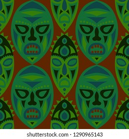 Vector Illustration. African Seamless Background with Ritual Masks for Textile or Paper. Ethnic Seamless Pattern with Color Trible Shamanic Masks for your Design. Vector Texture.