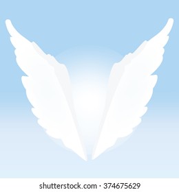 Vector illustration of angel wings on light blue background