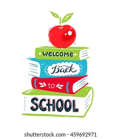Vector illustration of apple on books with Welcome Back to School lettering on white background.