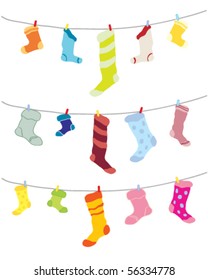 vector illustration of an assortment of odd socks pegged out to dry on a washing line