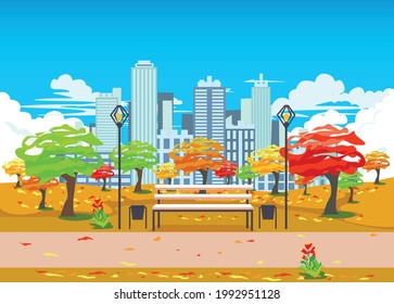 Vector illustration of an autumn city park with trees, variegated leaf fall, a park bench and lanterns on the background of a big city with skyscrapers in the daytime.