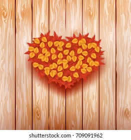 Vector illustration of an autumn heart from red maple leaves on a brown wooden background. Ready objects, elements with autumn background for your flyer, banner, infographics, poster, advertisement. 