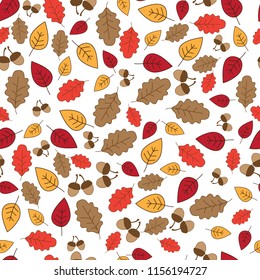 Vector illustration of autumn leaves and acorns seamless pattern.