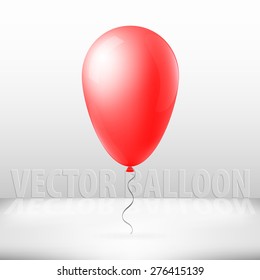 Vector illustration of vector balloon with ribbon isolated on background