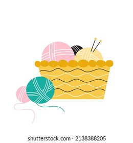 Vector illustration of basket with knitting needles and balls of yarn