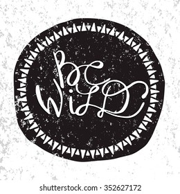 Vector illustration. "Be wild" calligraphic or lettering poster or postcard.