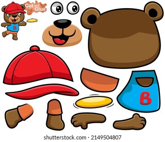 Vector illustration of bear cartoon wearing hat playing with flying disk. Cutout and gluing