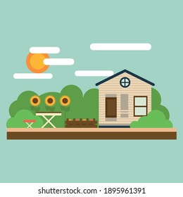 Vector illustration of a beautiful garden with a country house and a decorative garden wheelbarrow with flowers and colorful plants