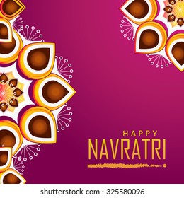  Vector illustration of beautiful rangoli with colourful background for Happy Navratri festival.