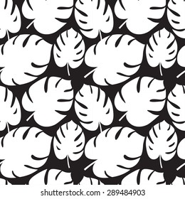 Vector illustration Beautiful seamless tropical jungle floral graphic seamless background pattern with palm leaves. Black and white