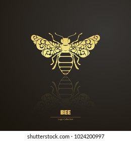 Vector illustration bee - symbol, icon, design element. Abstract Ornamental floral bold honeybee isolated on black background