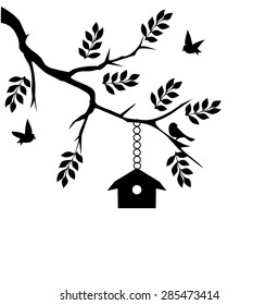 vector illustration of a bird house in the tree branch